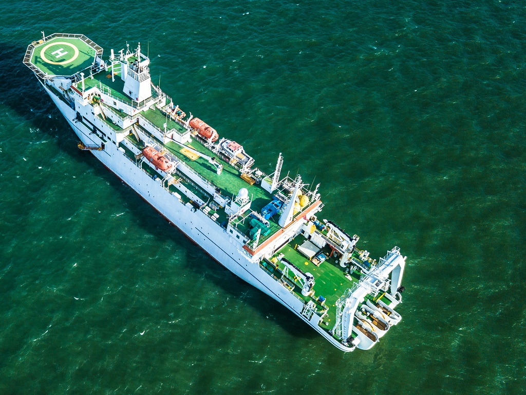 Cable laying ship anchored in Singapore, Aerial top view cable ship.